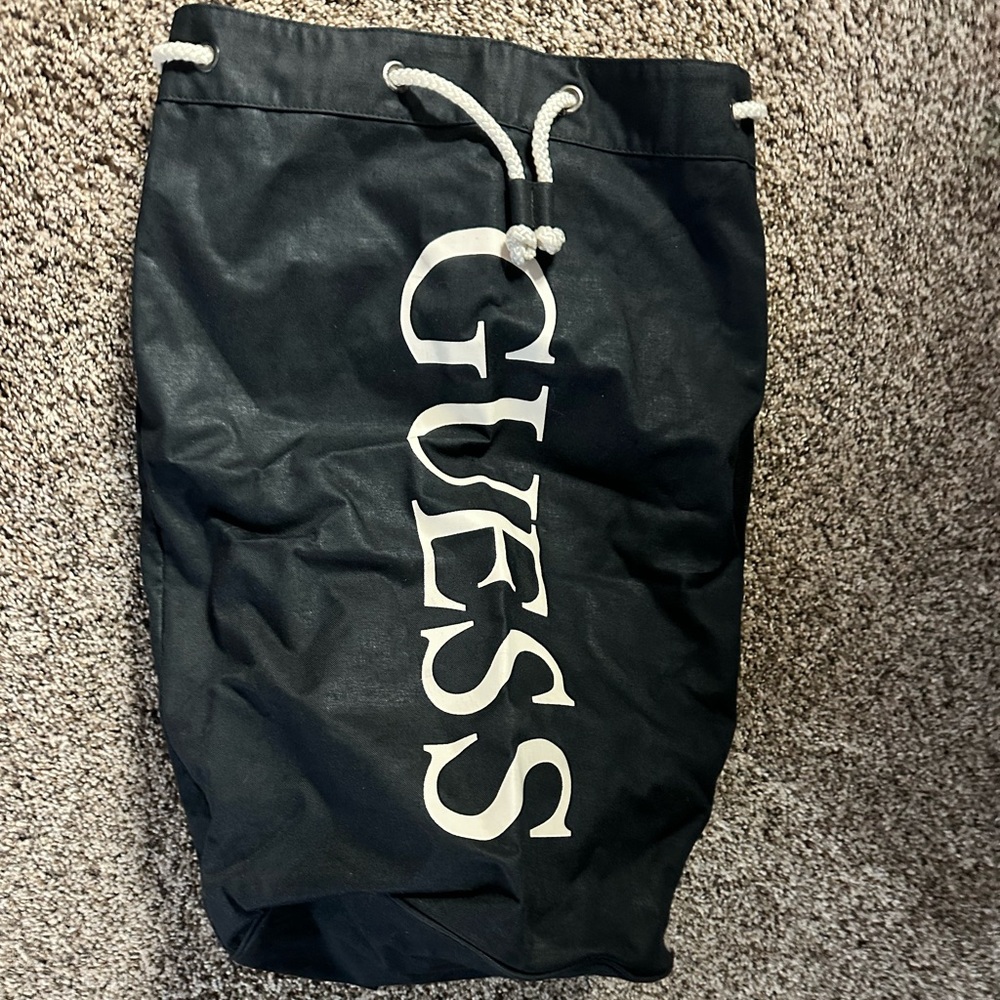 Guess brand bag with strap and handle Very thick